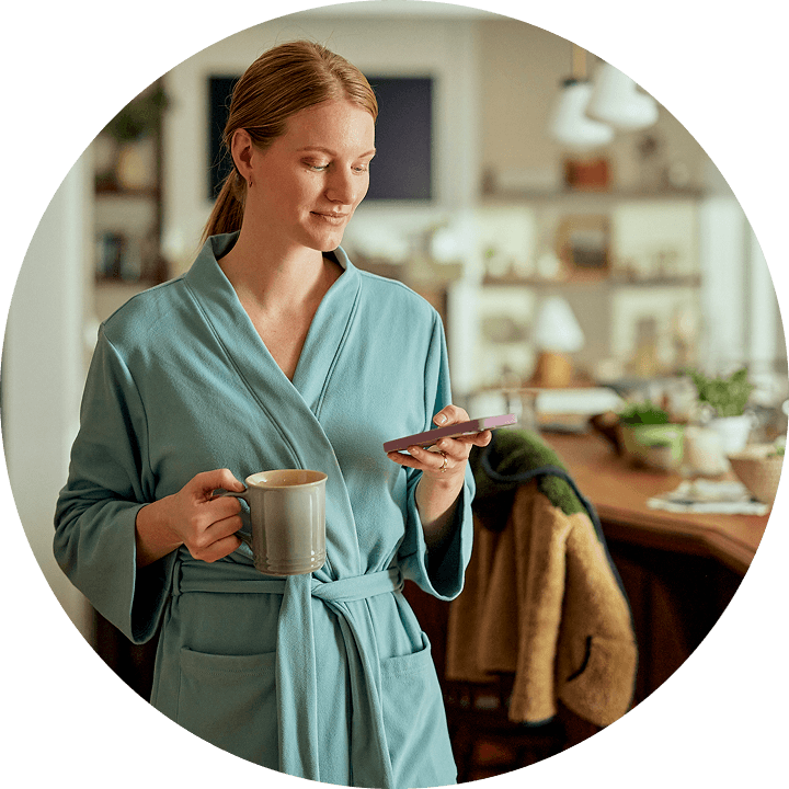 Rose at home during her leave and looking at her phone.